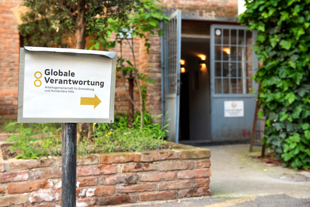 Entrance to the venue at Flimquartier Vienna where "Aid Matters 2025" took place.